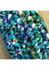 Manchette en wax turquoise, violet, noir, vert et orange