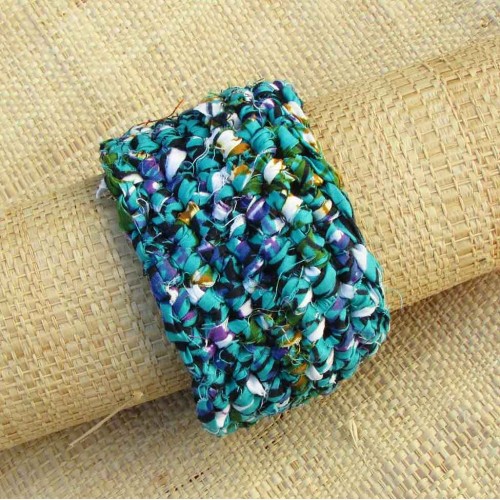 Manchette en wax turquoise, violet, noir, vert et orange