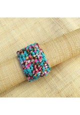 Manchette en wax turquoise, rose, brun, vert et jaune