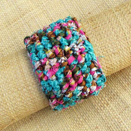 Manchette en wax turquoise, rose, brun, vert et jaune