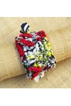 Manchette en wax rouge, marine, vert, jaune et blanc avec franges